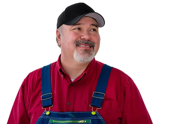 Alegre Masculino Trabalhador Vestindo Dungarees Contra Branco Fundo — Fotografia de Stock