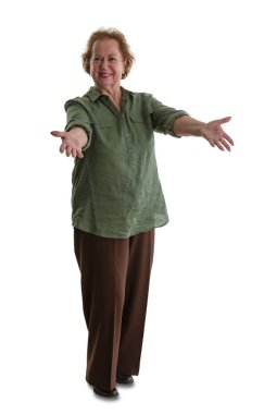 Portrait of senior woman doing welcoming gesture while standing against white background clipart