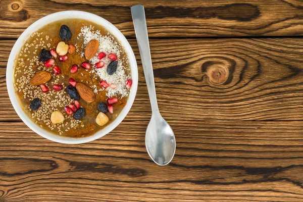 Bowl Delicious Sweet Brown Asure Dessert Assorted Nuts Sprinkled Wooden — Stock Photo, Image