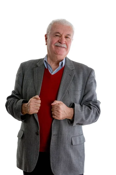 Suspicious Senior Man Looking Sceptically Camera Stands Gripping Lapels His — Stock Photo, Image