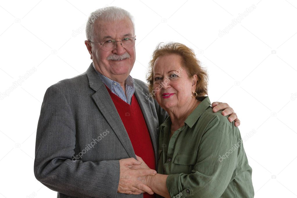 Studio portrait of cheerful elderly couple against white background