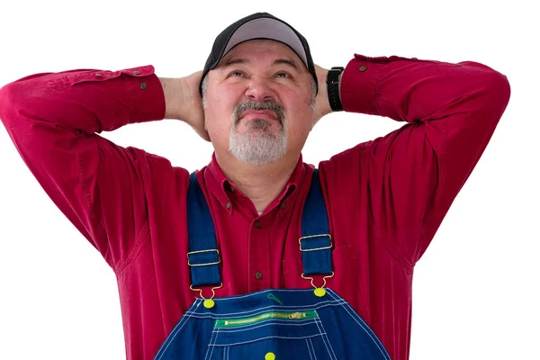 Farmer Worker Overalls Looking Hands Clasped His Head Disdainful Expression — Stock Photo, Image