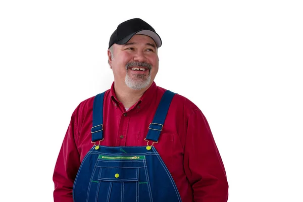 Smiling Confident Farmer Worker Dungarees Peaked Cap Looking Side Happy — Stock Photo, Image