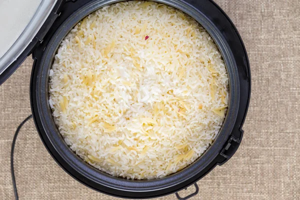 Cooked Savory Seasoned Rice Pilaf Bouillon Open Electric Rice Maker Stock Image