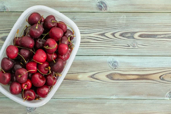 Plastic Punnet Ripe Red Cherries Arranged Side Old Weathered Wooden — Stock Photo, Image