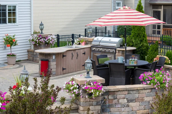 Upscale Outdoor Patio Kitchen Area Comfortable Wicker Furniture Shade Striped — Stock Photo, Image