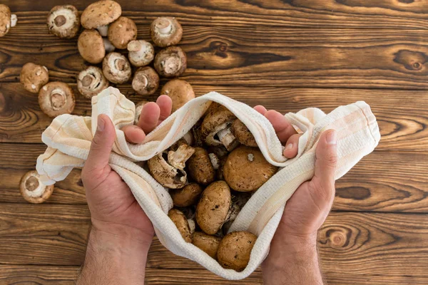 Person Using Hands Holding Towel Containing Multiple Baby Mushrooms Next — Stock Photo, Image