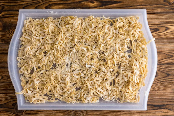 White Tray Drying Fresh Homemade Fettuccine Pasta Rustic Wooden Table — Stock Photo, Image