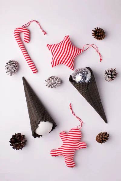 Christmas decorations and objects template design. Christmas toys, cones. View from above. Flat lay. Xmas decorations. Christmas theme.