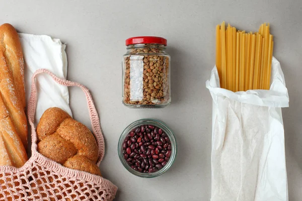 zero waste food shopping. eco natural bags and glass jar with fo