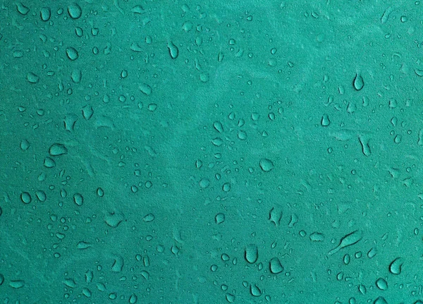 awning, raindrops on fabric, texture, rain tent bad weather, water, draining,awning drops rain texture water, textile; effect; color; water-repellent; summer; closeup; close-up; reflection; clear; splash; cloth