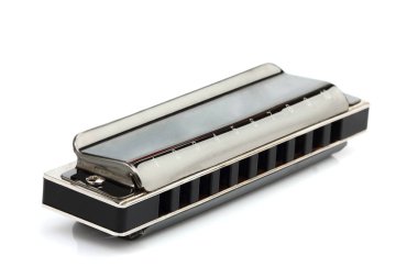 Harmonica isolated close up on white background. clipart