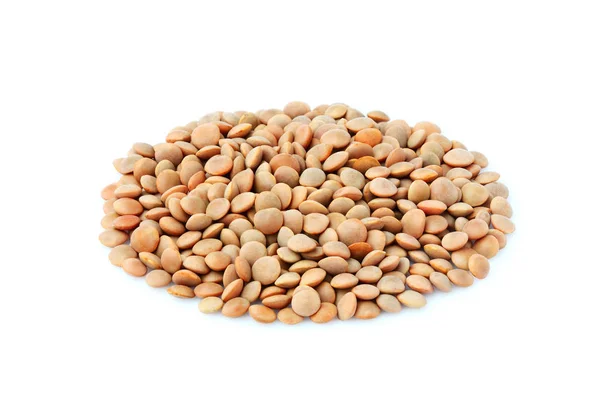 Stack of uncooked lentils isolated. — Stock Photo, Image