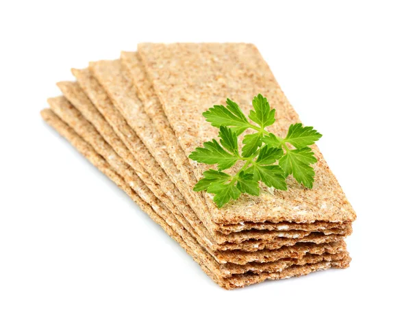 Stack of crispbread with fresh parsley. — Stock Photo, Image