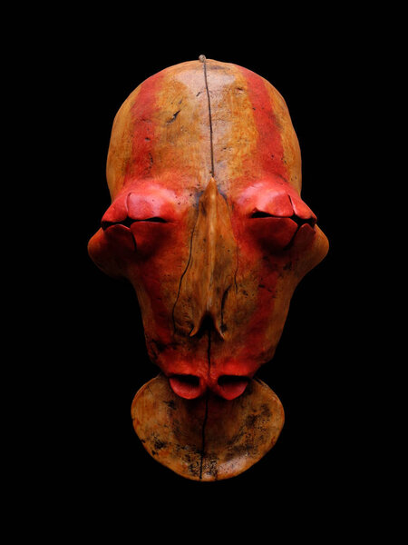 Ethnic mask. Mask for holiday ritual and carnival isolated on black background.                              