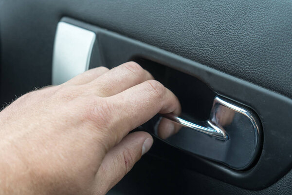 Handle to open the car from the inside.