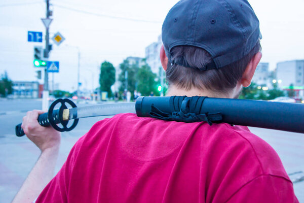 A criminal with a samurai sword went hunting.