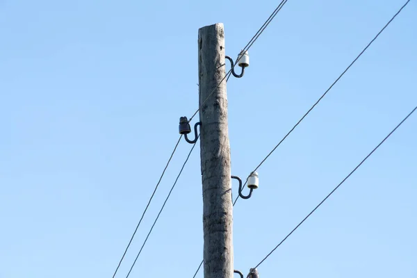 Foto Eines Hölzernen Strommasten Auf Dem Himmelshintergrund — Stockfoto