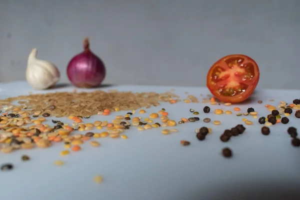 vintage style old salad with vegetables ingredients isolated on a plate.