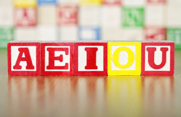 Aeiou Spelled Out Alphabet Building Blocks — Stock Photo, Image