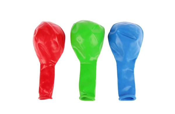 Deflated Red Green Blue Balloons — Stock Photo, Image