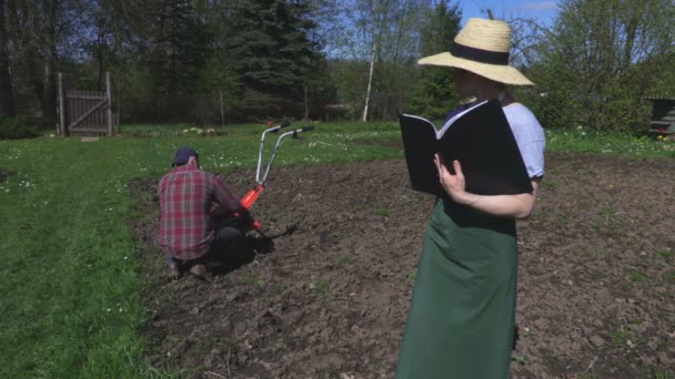 Gardeners Plans Soil Treatment — Stock Video
