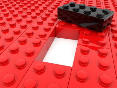 Kırmızı ve siyah oyuncak tuğla ile ortada boş yer