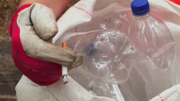 Workers Hand Cigarette Plastic Bottles Bag — Stock Video