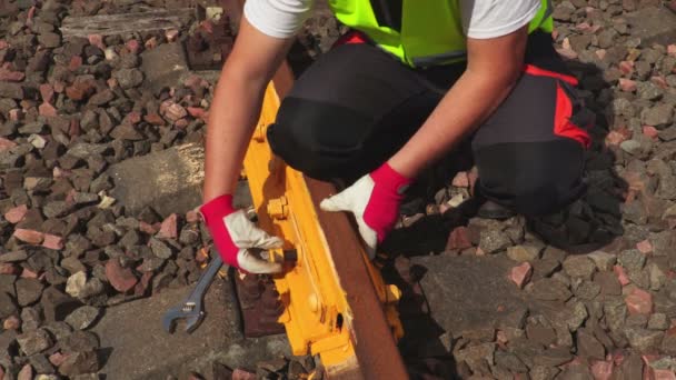 Worker Fixing Screw Nut Railway Track — Stock Video