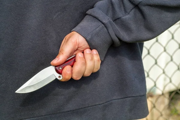 Man Keeping Knife Back — Stock Photo, Image