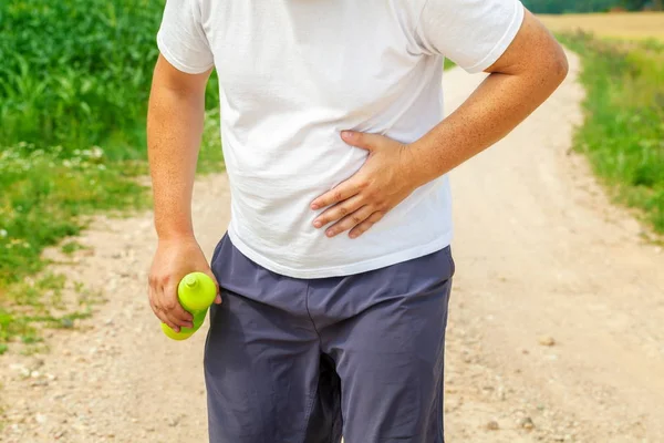 Läufer Mit Seitenschmerzen — Stockfoto