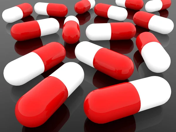 Pills in red and white on black background