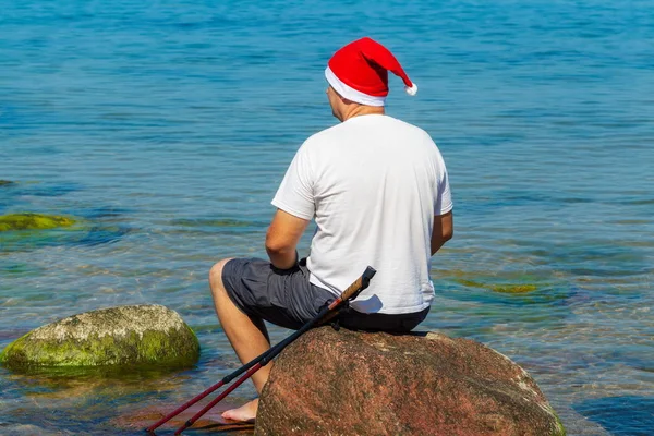 Man Santa Claus Hat Relaxing Sea Summer Day Stock Image