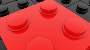 Oyuncak tuğla kırmızı siyah oyuncak tuğla üzerinde