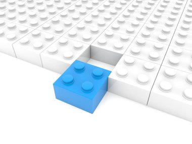 Beyazlar oyuncak blok ön planda mavi blok ile