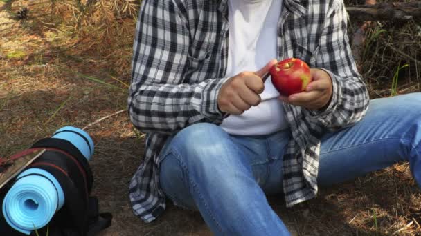 Hiker Peel Apple — Stock Video