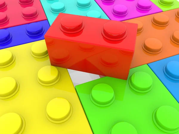 Red toy brick between colorful bricks