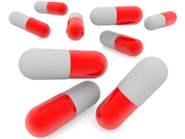 Beyaz üzerine kırmızı ve gri renklerde kapsül