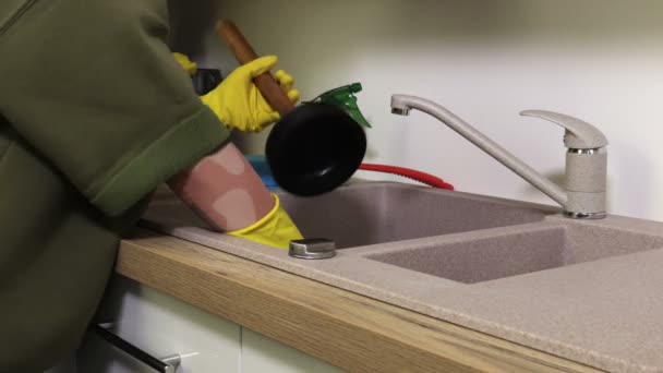 Woman Repairing Kitchen Sink — Stock Video