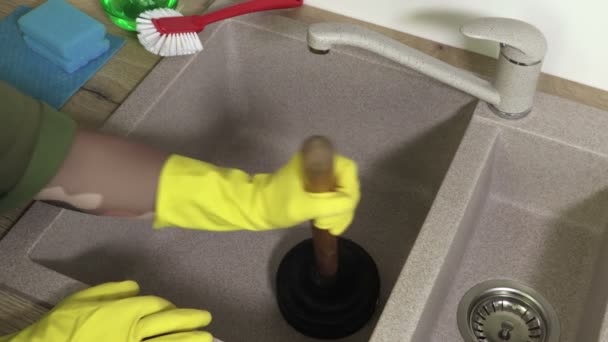Woman Try Unclog Sink Drain Fast — Stock Video