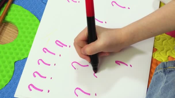 Girl Drawing Question Marks Paper — Stock Video