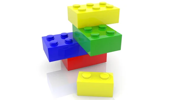 Een Kleine Speelgoed Baksteen Buurt Van Vier Speelgoed Bakstenen Verschillende — Stockfoto
