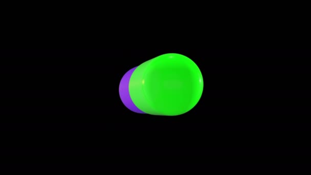 黒の背景に回転する青と緑の色の丸薬 — ストック動画