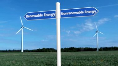 Rüzgar türbinlerinin yanında yenilenebilir enerji kavramına sahip beyazlı işaret direği