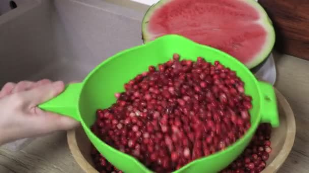 Woman Holding Shaking Green Bowl Cranberries — ストック動画