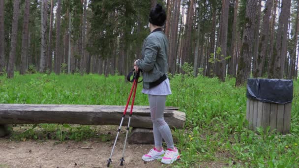 Woman Hiker Trekking Poles Relaxing Park — Stock Video