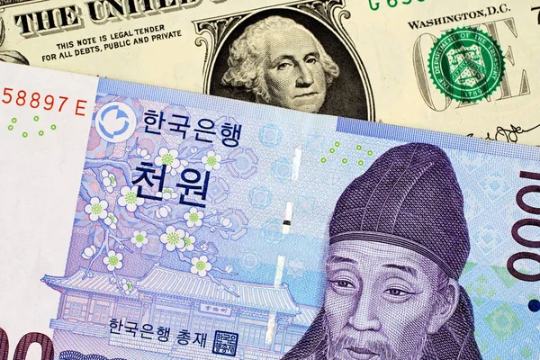 A South Korean 1000 won note with an American one dollar bill