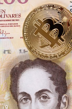 Görüntü arka planı 100 Venezuela bolivares altın bitcoin yakından