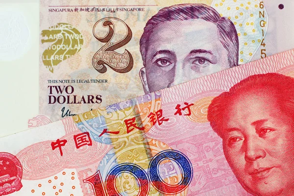Görüntü Iki Singapur Doları Banka Notunun Yüz Çin Yuan Banknot — Stok fotoğraf