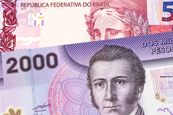 Purple Two Thousand Chilean Peso Bill Pink Brazilian Five Reais — Stock Photo, Image